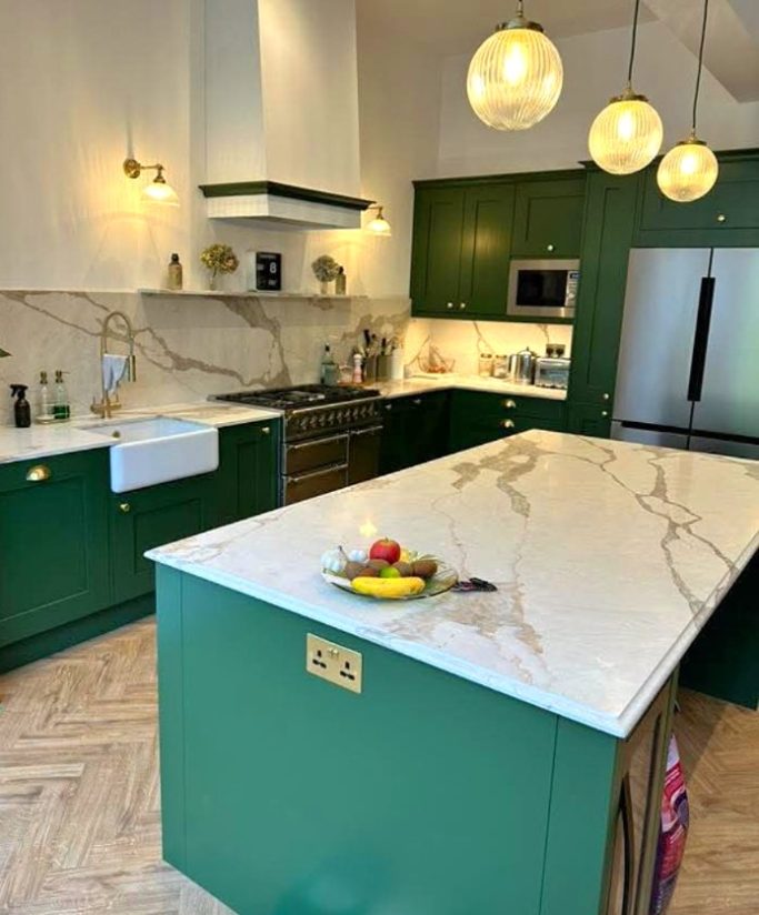 Kitchen island in DIY Kitchens Norton Oak shaker style with solid oak veneer doors and a quartz